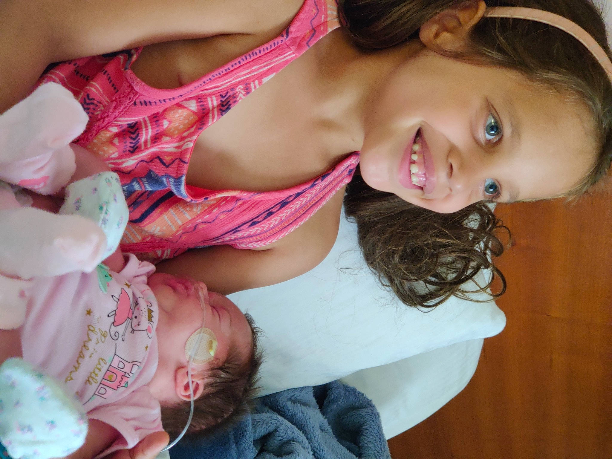 Effie is registered to the contest to win money with this photo: baby, baby_toddler_clothing, beauty, cheek, chest, child, dress, eyelash, flash_photography, happy, iris, joy, lip, mouth, people, person, pink, skin, smile, thigh