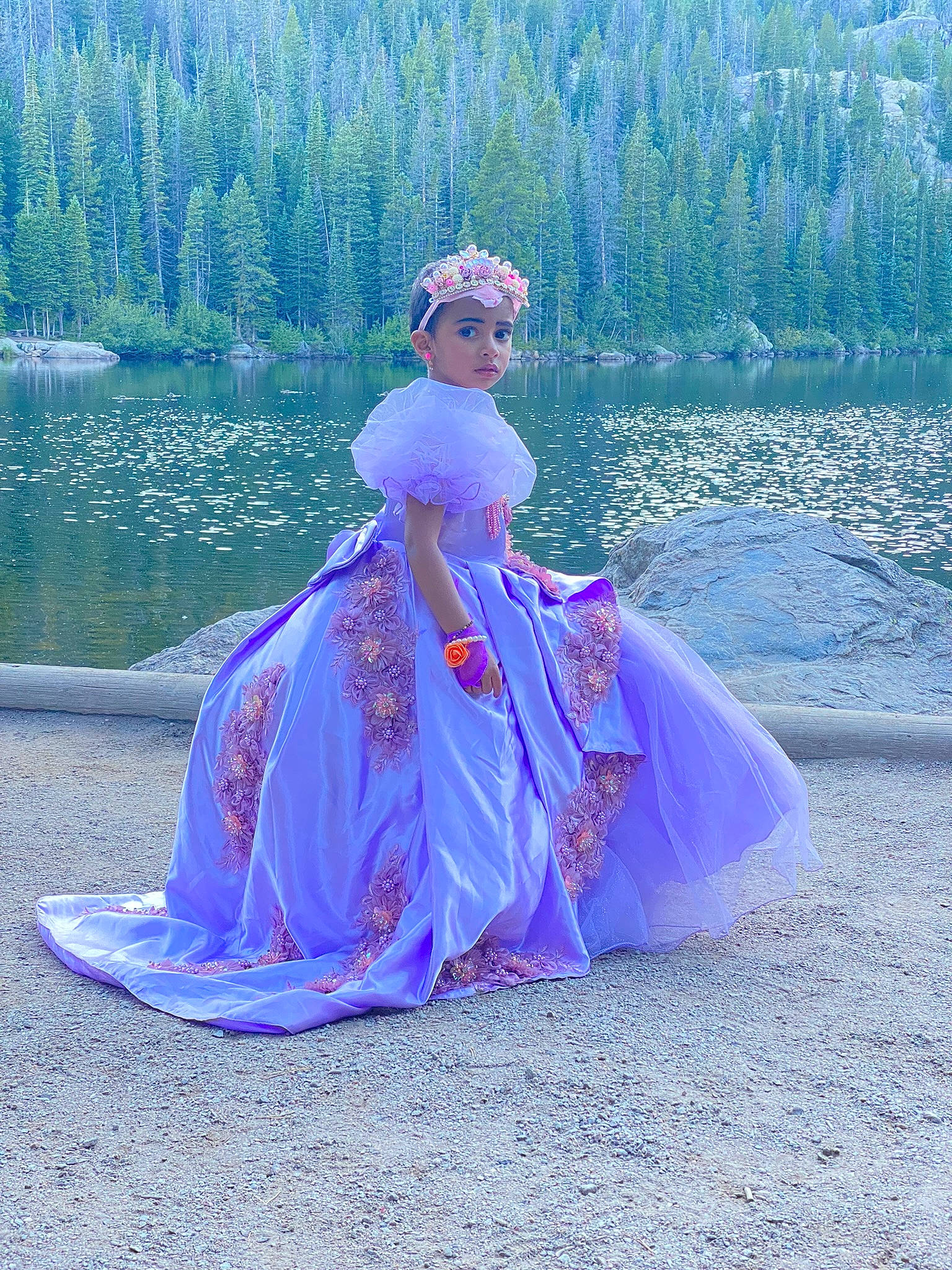 Kaira is registered to the contest to win money with this photo: bridal_accessory, costume_design, electric_blue, embellishment, event, fashion_design, formal_wear, fun, gown, grass, grassland, headwear, human_body, leisure, magenta, nature, people_in_nature, person, purple, recreation
