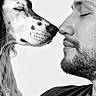 Scarface a rejoint le concours — aidez-le/la à gagner de superbes lots ! affection, animal, beard, black_and_white, calm, casual_clothing, close_up, dog, eyes_closed, face, friendship, human, indoor, love, man, nose_to_nose, pet, portrait, short_hair, spot_pattern