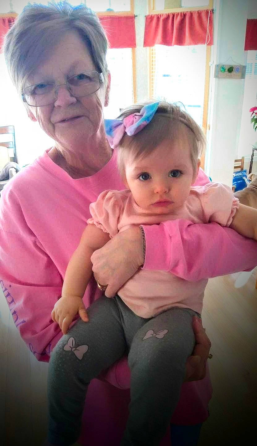 Liberty is registered to the contest to win money with this photo: arm, baby, baby_toddler_clothing, cheek, eye, face, finger, fun, gesture, glasses, hairstyle, happy, head, person, pink, shoulder, skin, snapshot, thumb, toddler