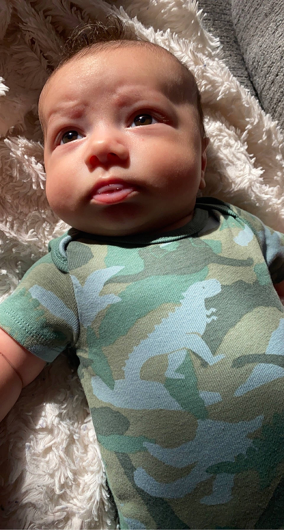 Arian joined the competition — help win amazing prizes! baby, baby_toddler_clothing, cheek, chest, child, chin, comfort, eyelash, grass, happy, linens, military_camouflage, nose, pattern, person, portrait_photography, skin, sleeve, t_shirt, textile