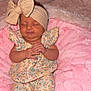 Kinsley is registered to the contest to win money with this photo: baby, infant, sleeping, headband, bow, floral_outfit, pink_blanket, soft_texture, cute, newborn, small_hands, small_feet, resting, cozy, indoors, portrait, child, adorable, peaceful, fashion