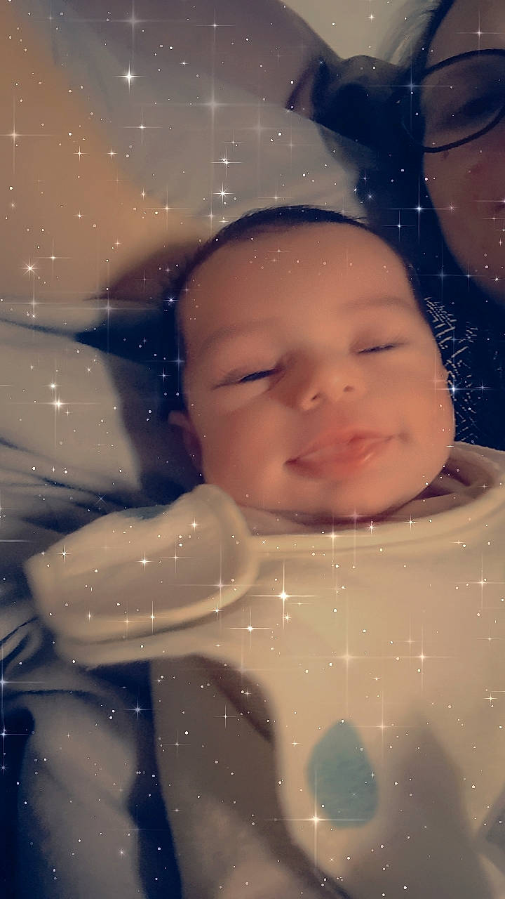 Mya participe au concours pour gagner de l'argent avec cette photo : art, baby, baby_toddler_clothing, bib, cheek, child, chin, eyebrow, face, fun, happy, head, nature, nose, organism, pattern, people_in_nature, person, sky, space