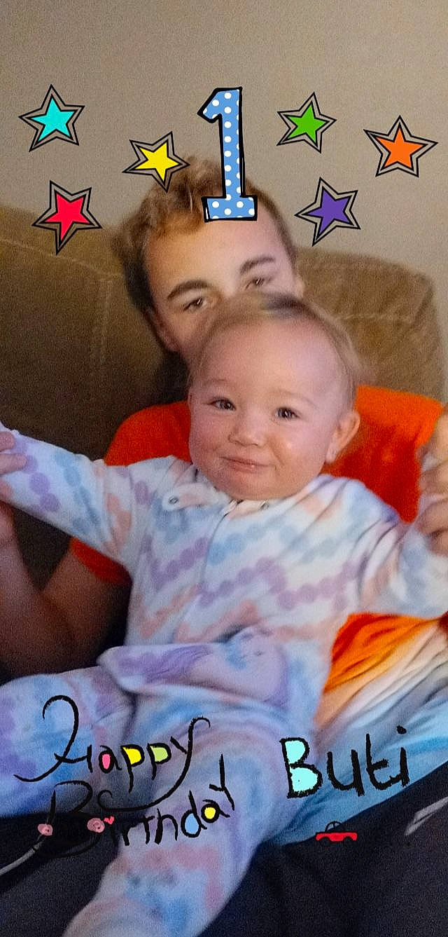 Jayden is registered to the contest to win money with this photo: baby, baby_toddler_clothing, cheek, child, couch, event, fun, happy, joy, leisure, person, photo_caption, photography, picture_frame, play, portrait_photography, room, sitting, smile, t_shirt