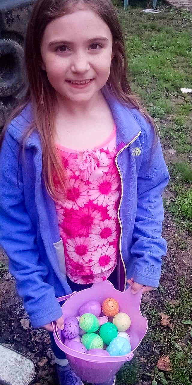 Avery is registered to the contest to win money with this photo: ball, brown_hair, child, easter, easter_egg, electric_blue, event, face, fun, grass, happy, joy, magenta, party_supply, people_in_nature, person, pink, plant, sleeve, smile