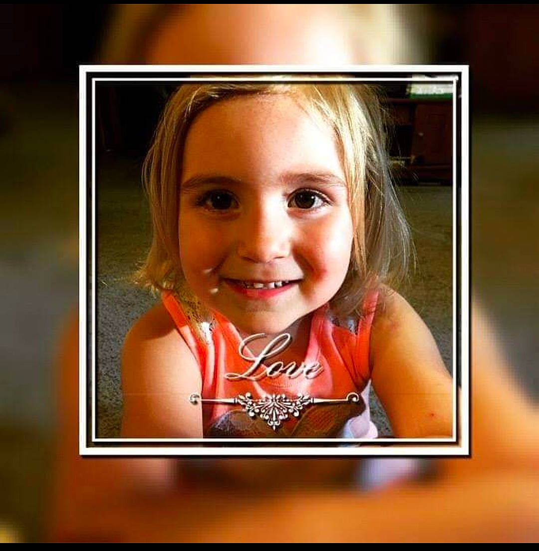 Avery joined the competition — help win amazing prizes! blond, brown_hair, child, child_model, chin, display_device, eyelash, flash_photography, fun, happy, joy, laugh, media, person, photo_caption, picture_frame, portrait, portrait_photography, rectangle, room