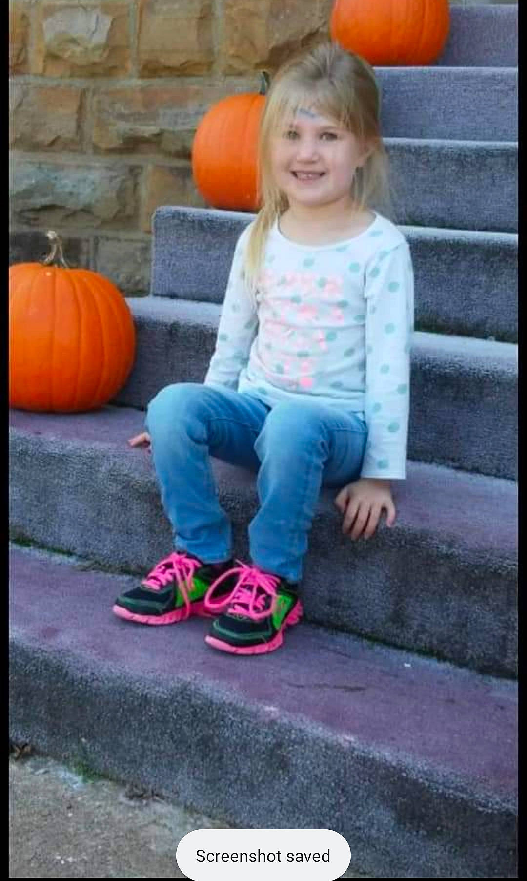 Danica is registered to the contest to win money with this photo: calabaza, clothing, cool, cucurbita, denim, gourd, happy, human_body, jeans, joy, leg, leisure, orange, person, photograph, plant, pumpkin, shoe, smile, squash