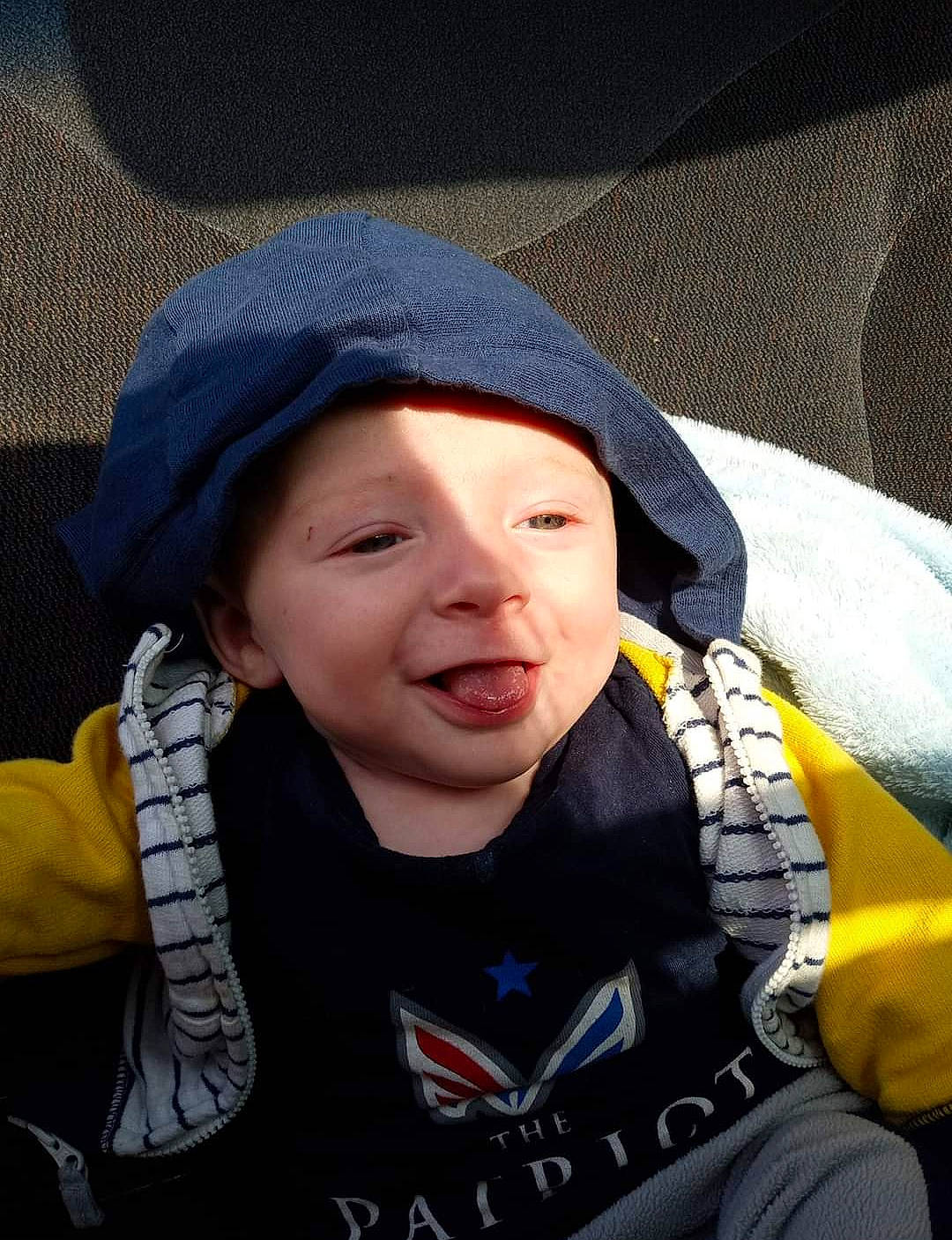 Kacen joined the competition — help win amazing prizes! cap, cheek, child, electric_blue, eye, eyebrow, fashion_accessory, fun, gesture, happy, headgear, headwear, hood, nose, outerwear, person, product, recreation, smile, toddler