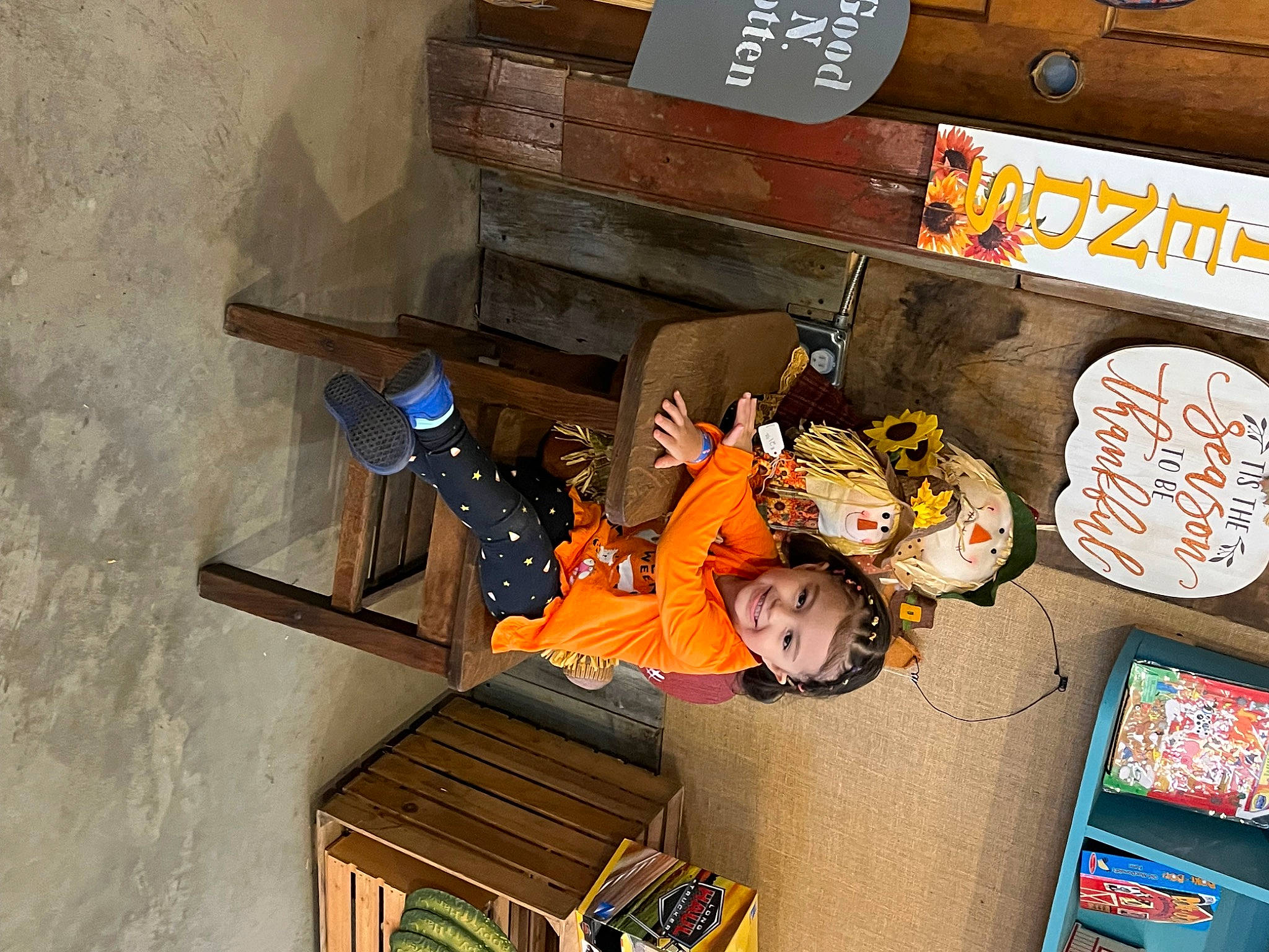 Odessa is registered to the contest to win money with this photo: fun, games, headwear, joy, machine, person, recreation, room, shelf, toddler, toy, wood, world