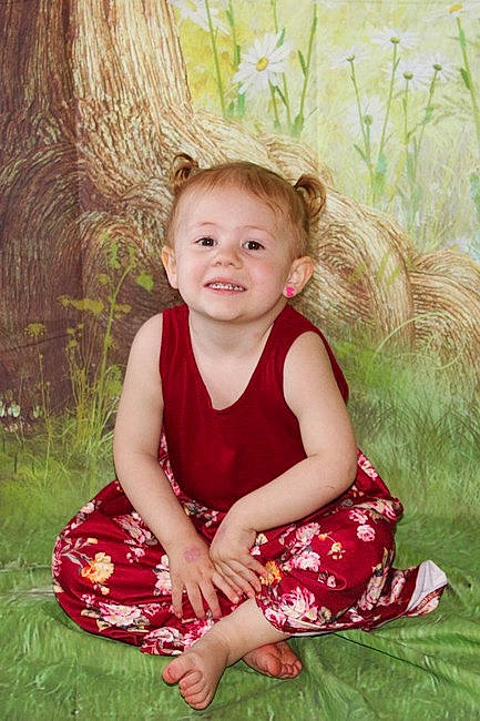 Everleigh joined the competition — help win amazing prizes! baby_toddler_clothing, child, day_dress, dress, eye, flash_photography, fun, grass, grass_family, happy, joy, pattern, people_in_nature, person, plant, portrait_photography, sitting, skin, smile, toddler