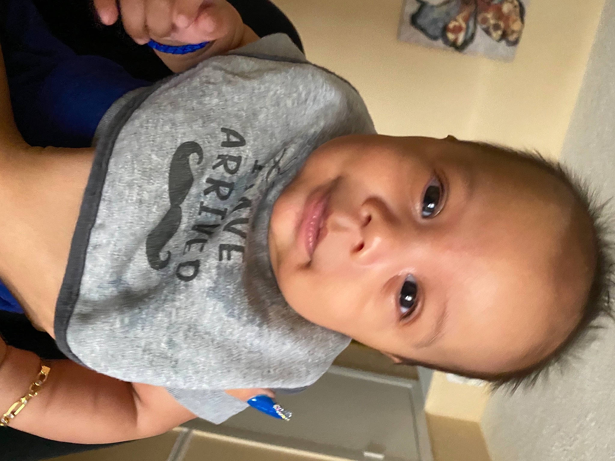 Edwin is registered to the contest to win money with this photo: baby, cheek, clothing, cool, ear, elbow, eyelash, finger, forehead, gesture, jaw, lip, mouth, nail, neck, nose, person, sleeve, smile, thumb