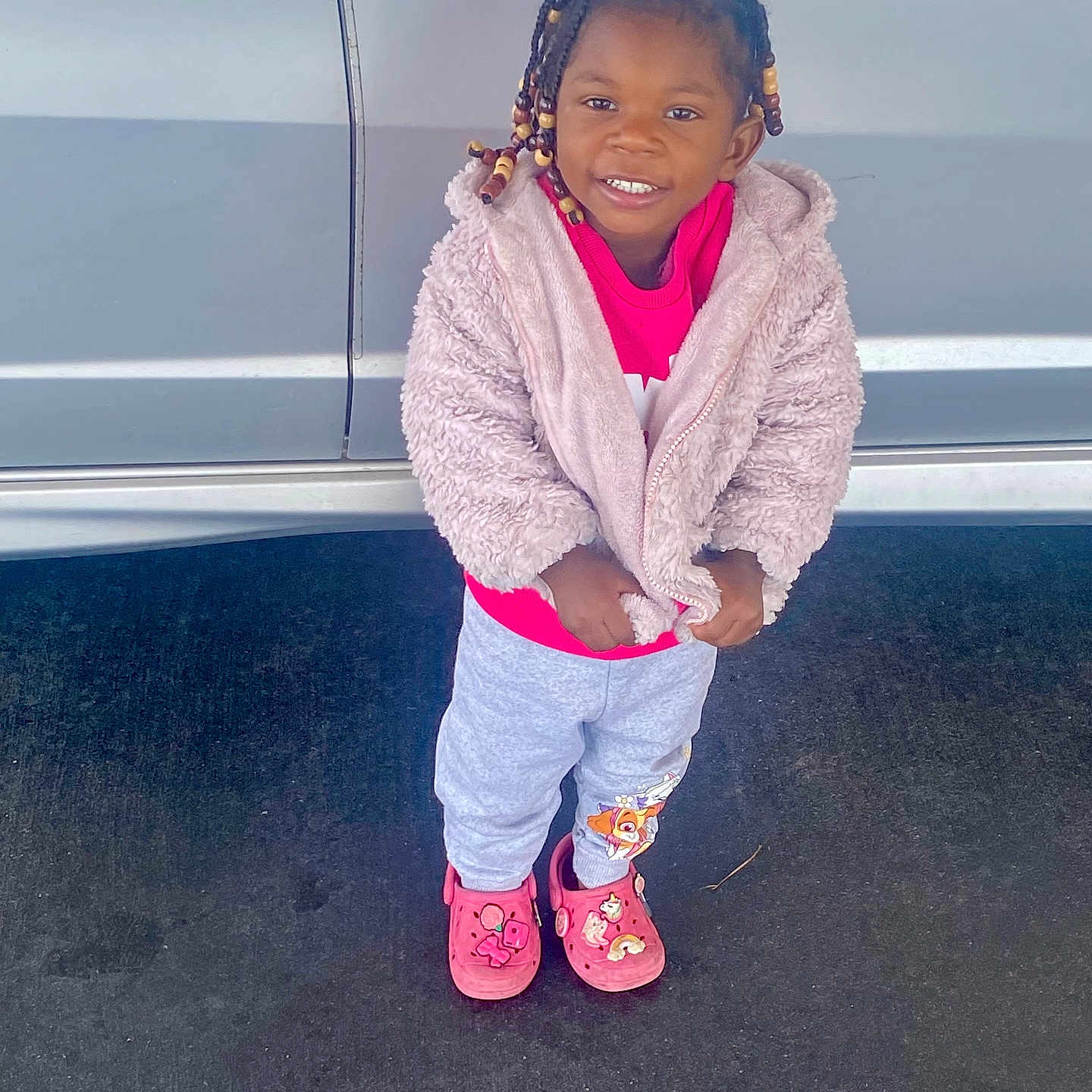 Honesty joined the competition — help win amazing prizes! child, clothing, coat, curlyhair, face, female, footwear, girl, hair, happy, head, jacket, person, photography, portrait, shoe, sitting, sleeve, smile, standing