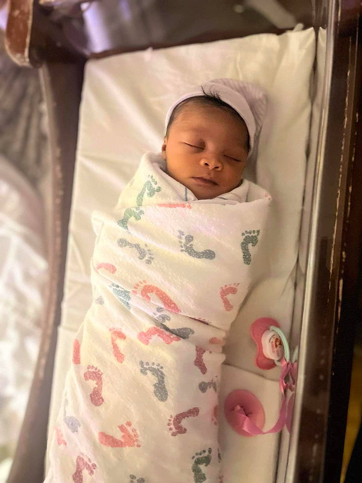 Nevaeh is registered to the contest to win money with this photo: baby, baby_products, baby_safety, baby_sleeping, baby_toddler_clothing, bedding, bedtime, cheek, child, comfort, head, infant_bed, linens, person, room, skin, sleep, sleeve, textile, toddler