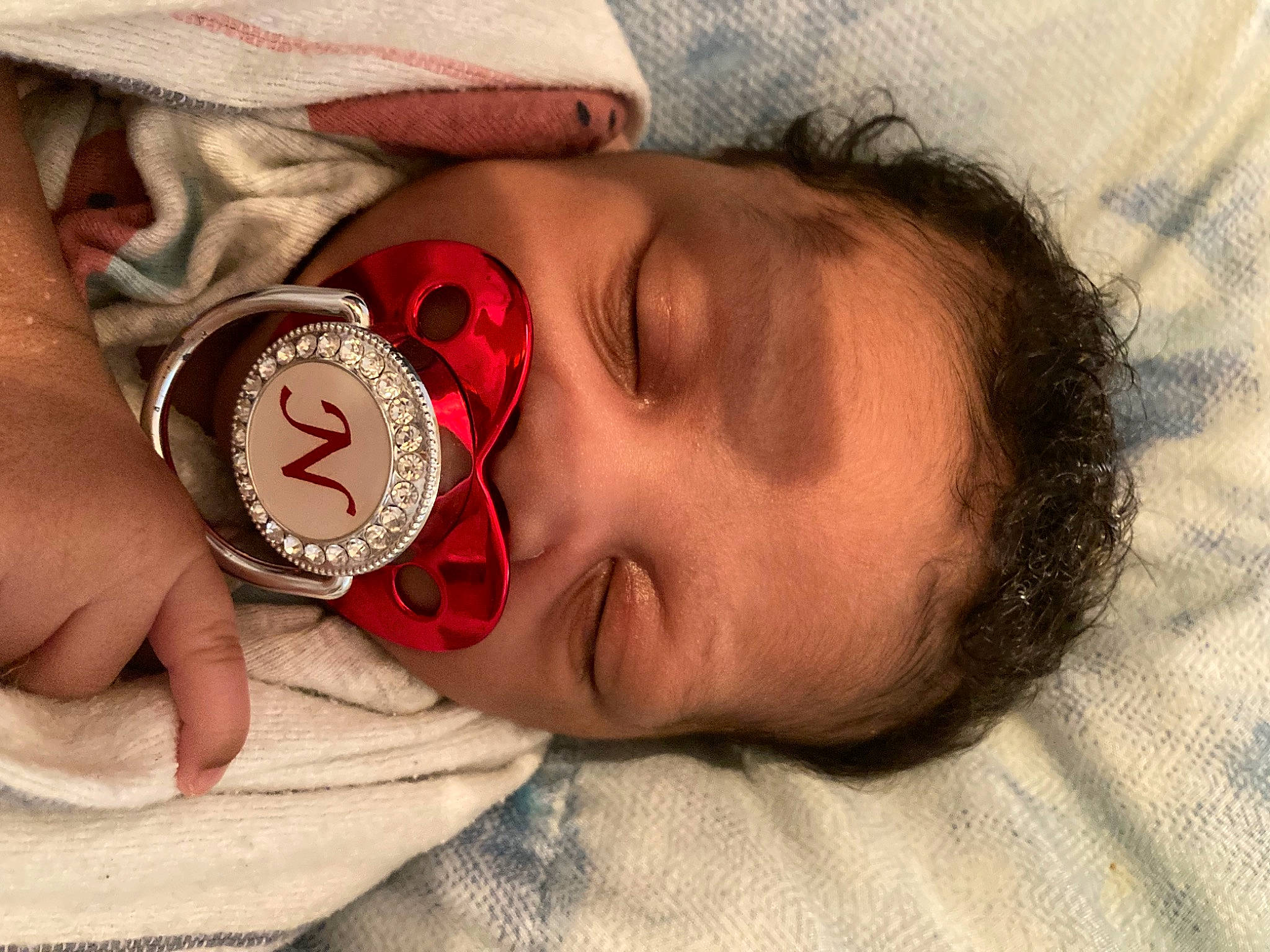 Nevaeh is registered to the contest to win money with this photo: baby, cap, cheek, child, chin, close_up, comfort, eyelash, finger, hand, happy, lip, mouth, nail, neck, nose, pattern, person, skin, toddler