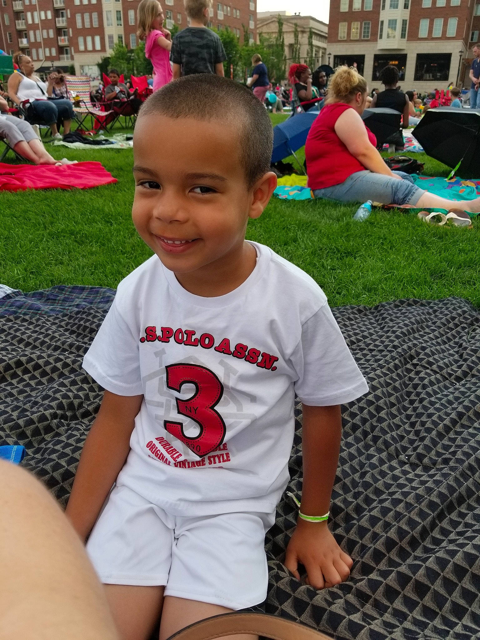 Devaughn joined the competition — help win amazing prizes! child, fun, grass, joy, lawn, leg, leisure, party, person, play, recreation, sitting, summer, t_shirt, toddler, vacation