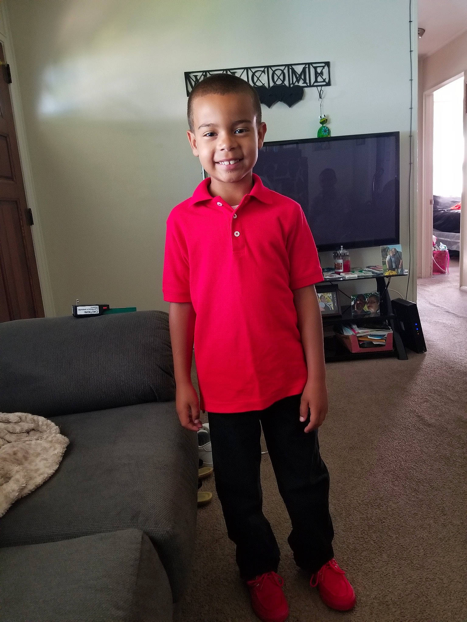 Devaughn joined the competition — help win amazing prizes! arm, child, flooring, footwear, joint, joy, male, person, photography, pink, red, room, shirt, shoe, shoulder, sleeve, standing, t_shirt, vacation