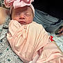 newborn, baby, sleeping, pink, bow, hat, fabric, wrapped, person, jeans, hand, closeup, indoor, soft, peaceful, infant, portrait, cute, resting, child