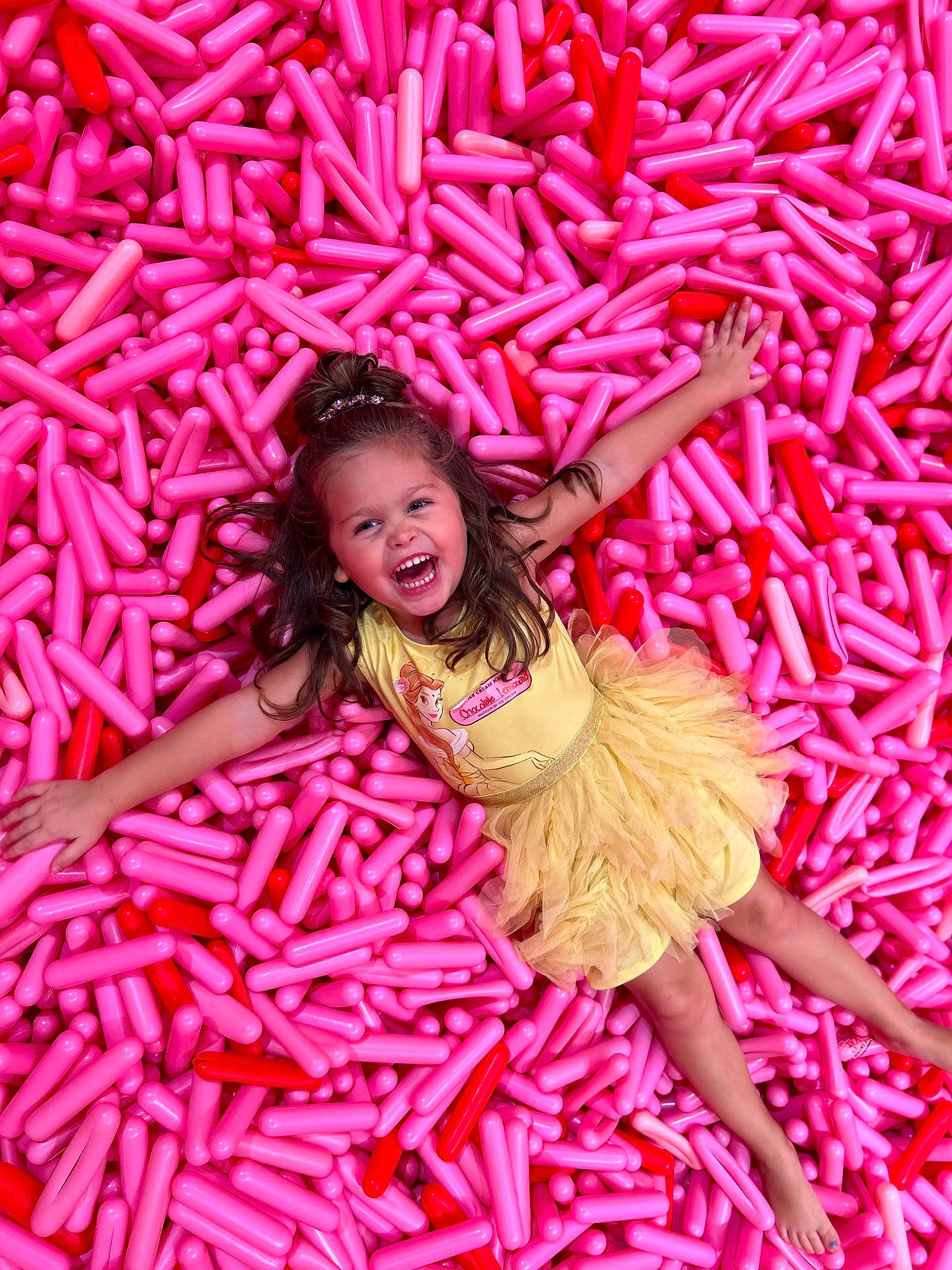 Sunnie joined the competition — help win amazing prizes! baby_toddler_clothing, day_dress, event, flowering_plant, fun, grass, happy, magenta, natural_foods, pattern, peach, people_in_nature, person, petal, pink, plant, red, smile, spring, sweetness