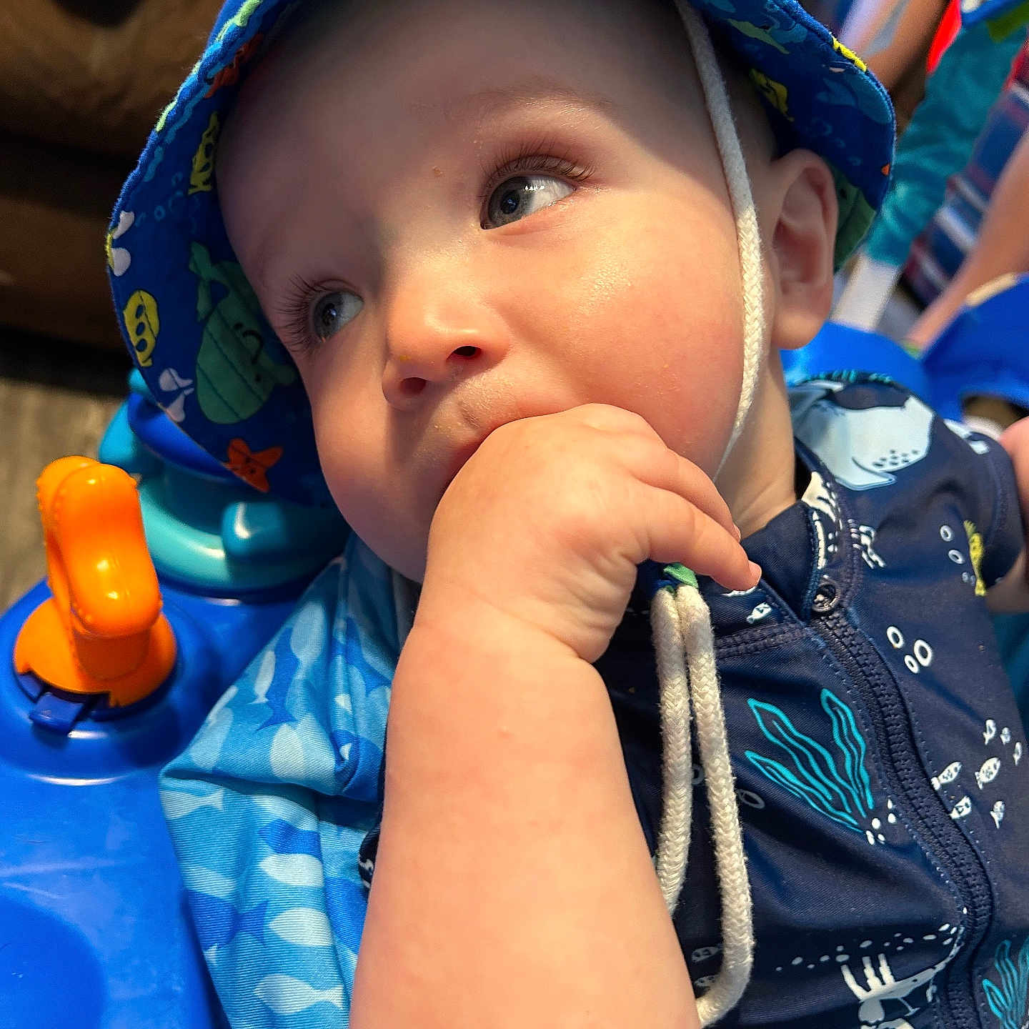Karl joined the competition — help win amazing prizes! baby, baseballcap, biting, bodypart, boy, cap, child, clothing, coat, face, finger, hand, hat, head, helmet, jacket, male, person, photography, portrait