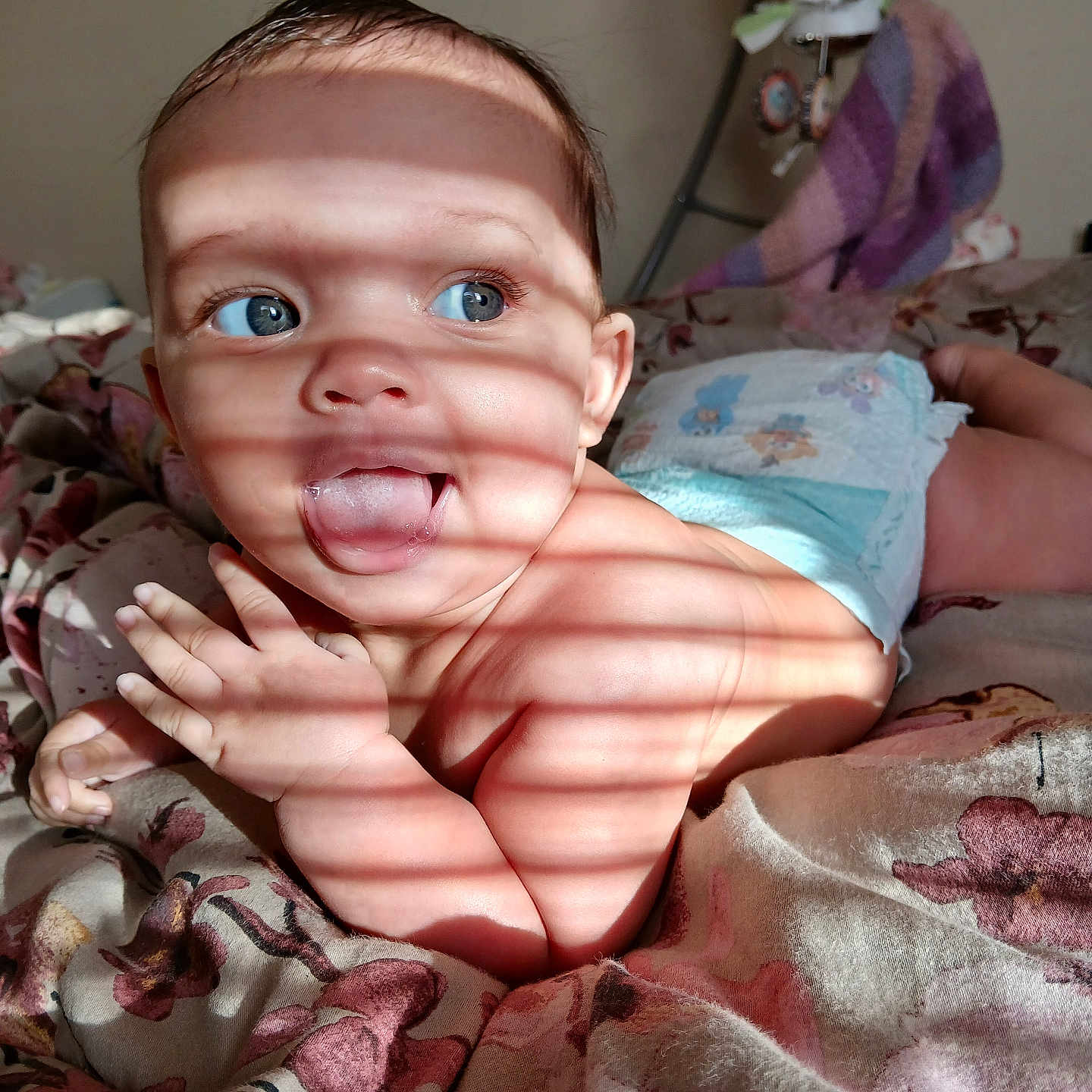 Loyalty is registered to the contest to win money with this photo: baby, bed, bedroom, blanket, bodypart, couch, diaper, face, finger, furniture, hand, happy, head, mouth, newborn, person, photography, portrait, quilt, smile