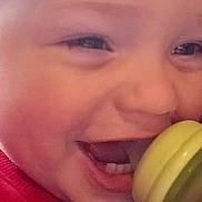 Oakley is registered to the contest to win money with this photo: toddler, child, smiling, laughing, bottle, indoor, close_up, red_shirt, face, expression, happy, young_child, person, baby, mouth, teeth, skin, head, hair, joy