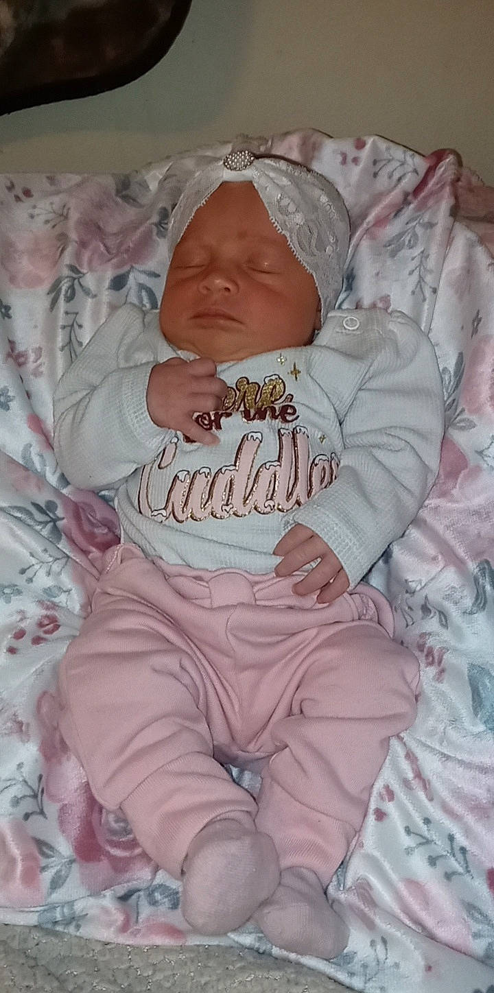 Aniyah joined the competition — help win amazing prizes! baby, baby_products, baby_sleeping, baby_toddler_clothing, cheek, child, clothing, comfort, eye, face, finger, hat, headgear, headwear, linens, pattern, person, pink, skin, sleeve