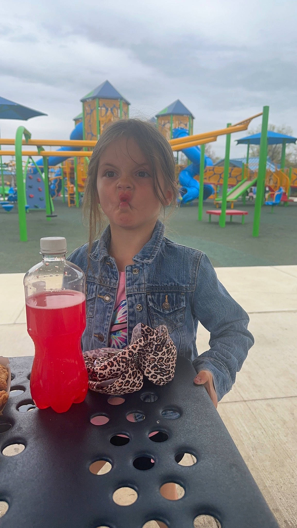 Kayson is registered to the contest to win money with this photo: bottle, carbonated_soft_drinks, child, city, cloud, drink, drinking, drinkware, event, fun, leisure, liquid, pattern, person, plastic_bottle, recreation, sky, soft_drink, toddler, travel