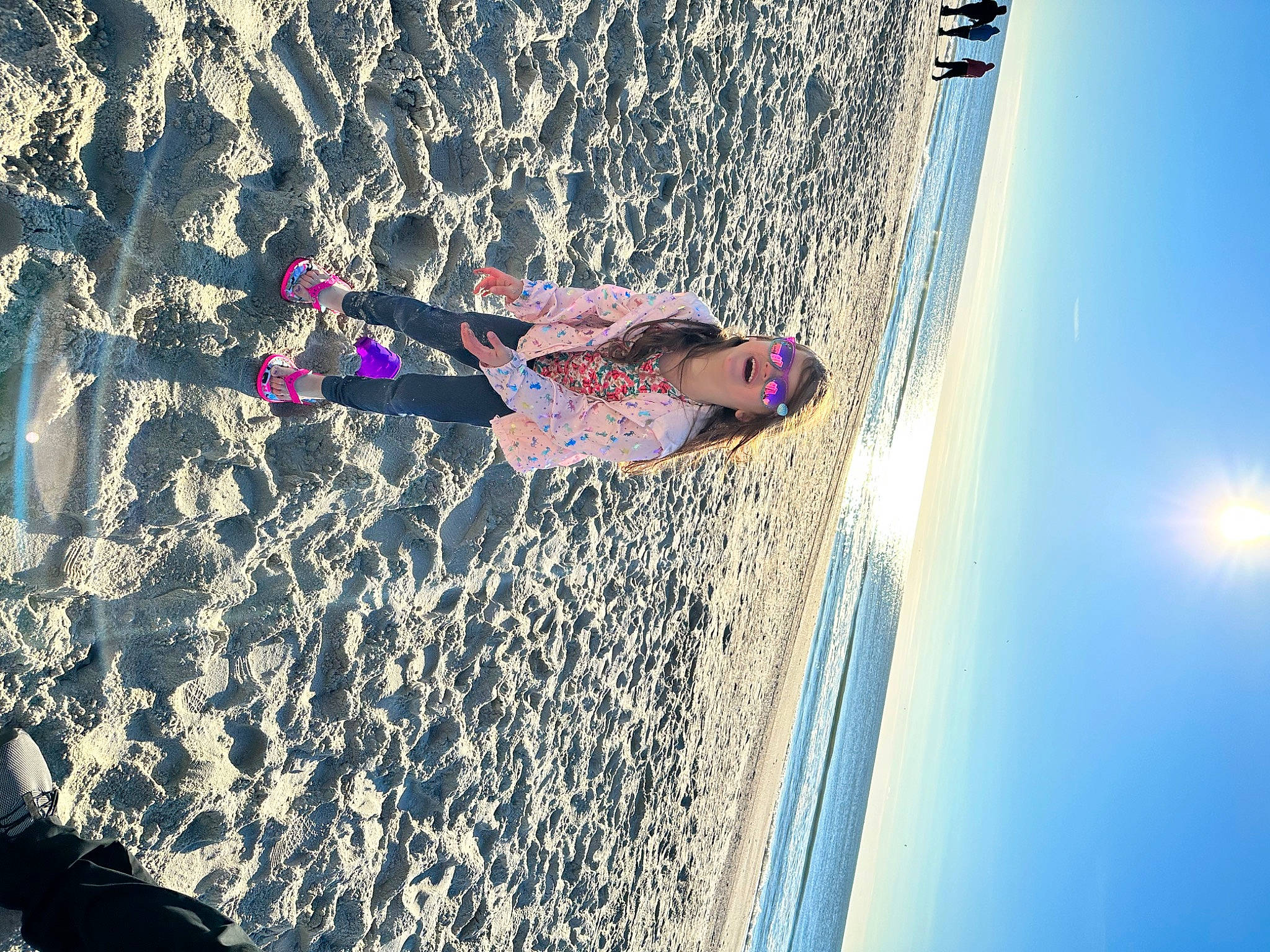 Kayson is registered to the contest to win money with this photo: adventure, azure, beach, cool, fun, happy, human_body, lake, leg, leisure, line, people_in_nature, person, plant, recreation, sky, sport_climbing, travel, tree, water