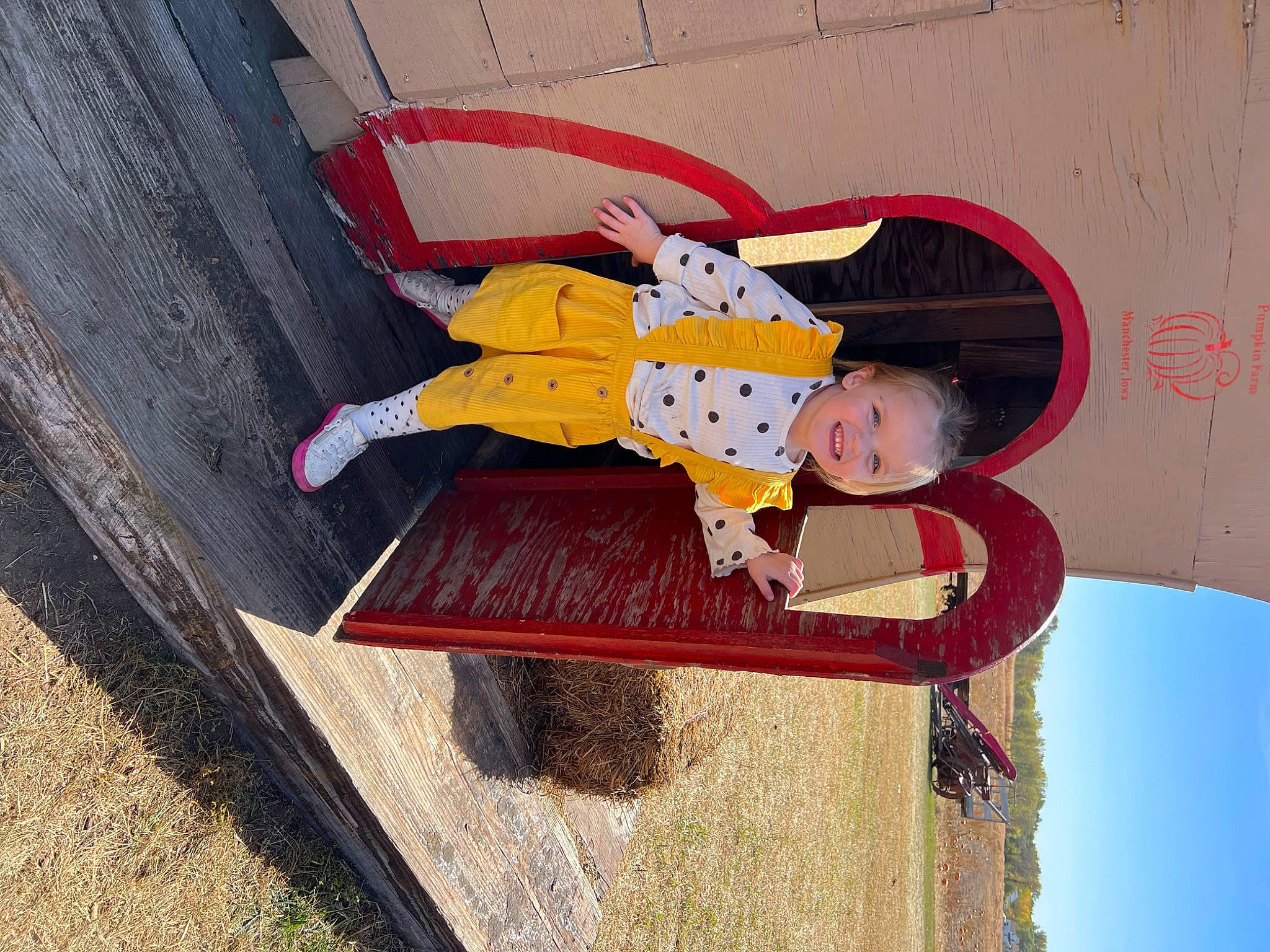 Lillian is registered to the contest to win money with this photo: carmine, child, fun, happy, hat, joy, leisure, person, sitting, toddler, toy, wood