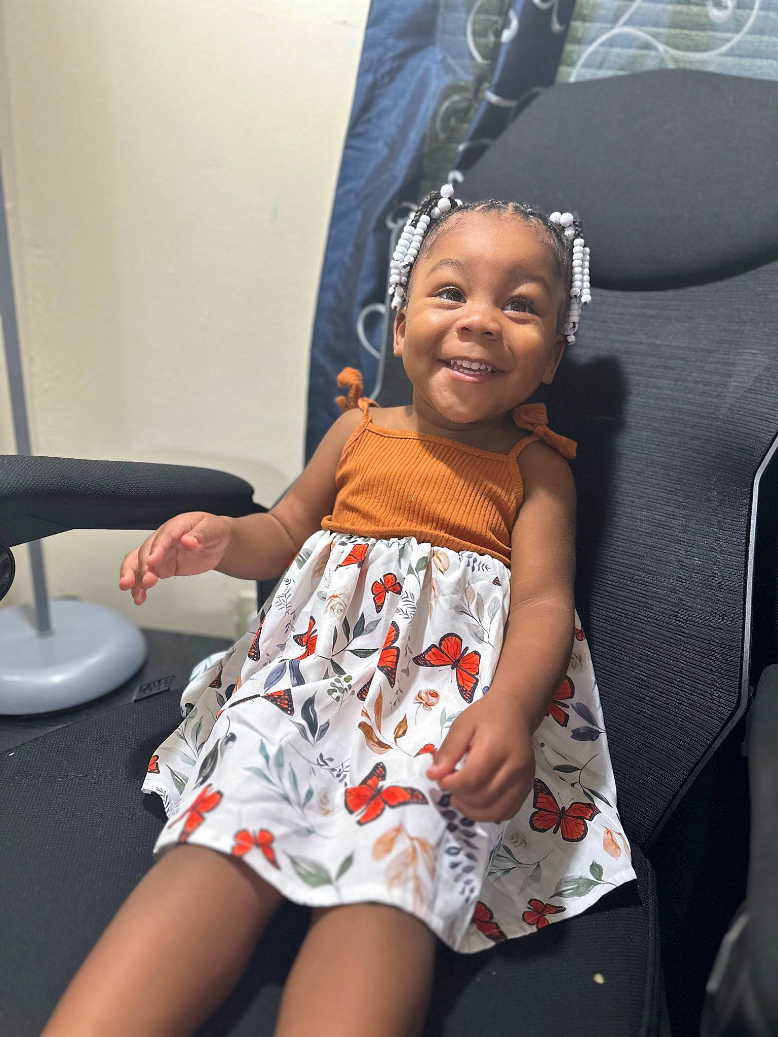 Anova is registered to the contest to win money with this photo: baby_toddler_clothing, black_hair, child, day_dress, dress, event, face, fashion_design, flash_photography, fun, happy, human, human_leg, joy, person, shoulder, skin, sleeve, smile, standing