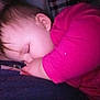 baby, sleeping, child, infant, person, closeup, pink_clothing, peaceful, resting, cozy, portrait, face, hand, young_child, cuddling, indoor, soft_light, tender_moment, human, parent