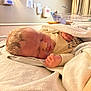 baby, bed, blanket, blanket_wrap, child, cozy, cute, head, hospital, indoors, infant, medical, newborn, newborn_clothing, peaceful, person, resting, skin, sleeping, soft_lighting