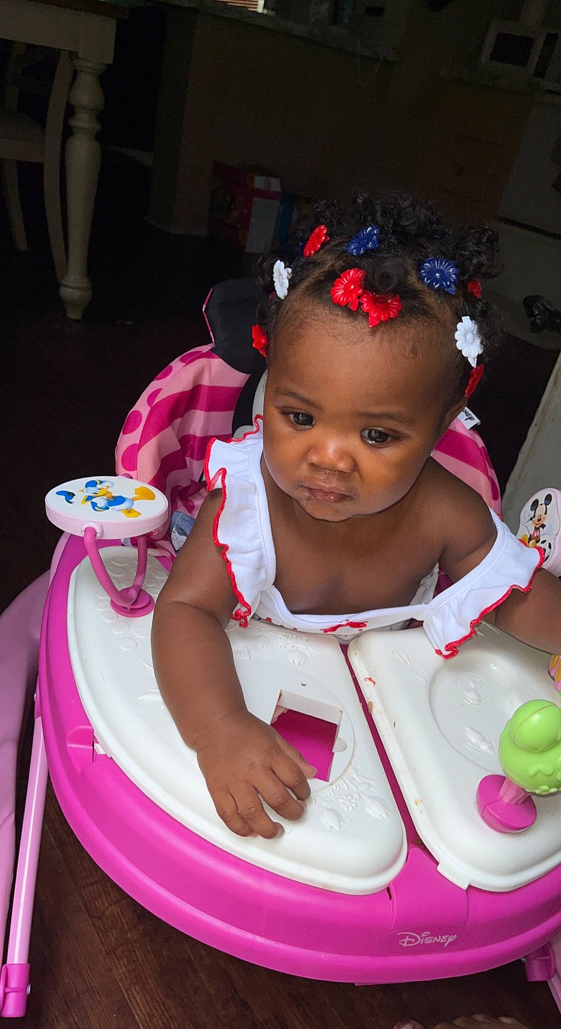 Lei'Yonna is registered to the contest to win money with this photo: baby, baby_toddler_clothing, chair, cheek, child, event, fashion_accessory, fun, happy, jewellery, necklace, party_supply, person, pink, plate, sitting, sweetness, table, tableware, toddler