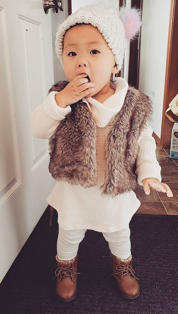 Infinity is registered to the contest to win money with this photo: beauty, beige, child, child_model, clothing, fashion, fashion_accessory, footwear, fur, fur_clothing, head, headgear, lip, neck, outerwear, person, skin, sleeve, textile, toddler