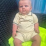 baby, blue_eyes, child, chubby, clothing, cute, expression, furniture, indoor, infant, neon_green, person, portrait, shirt, shorts, sitting, skin, towel, wicker_chair, young