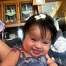 Dashly joined the competition — help win amazing prizes! baby, blanket, cabinet, child, close_up, couch, dark_hair, face, family_photo, floral_dress, flower_hair_clip, furniture, happy, home, indoor, infant, portrait, selfie, sitting, smiling