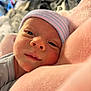Ziah is registered to the contest to win money with this photo: newborn, baby, infant, face, hat, blanket, soft, closeup, resting, sleepy, cute, skin, portrait, child, cozy, indoors, warm_light, pink, striped_hat, expression