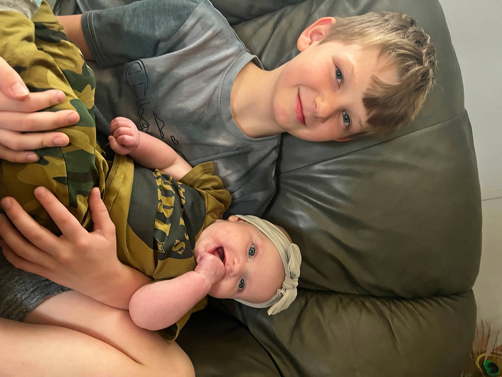 Cace joined the competition — help win amazing prizes! baby, baby_toddler_clothing, cheek, child, comfort, couch, eye, face, finger, flash_photography, gesture, hair, happy, head, headwear, human_body, joy, leg, person, skin