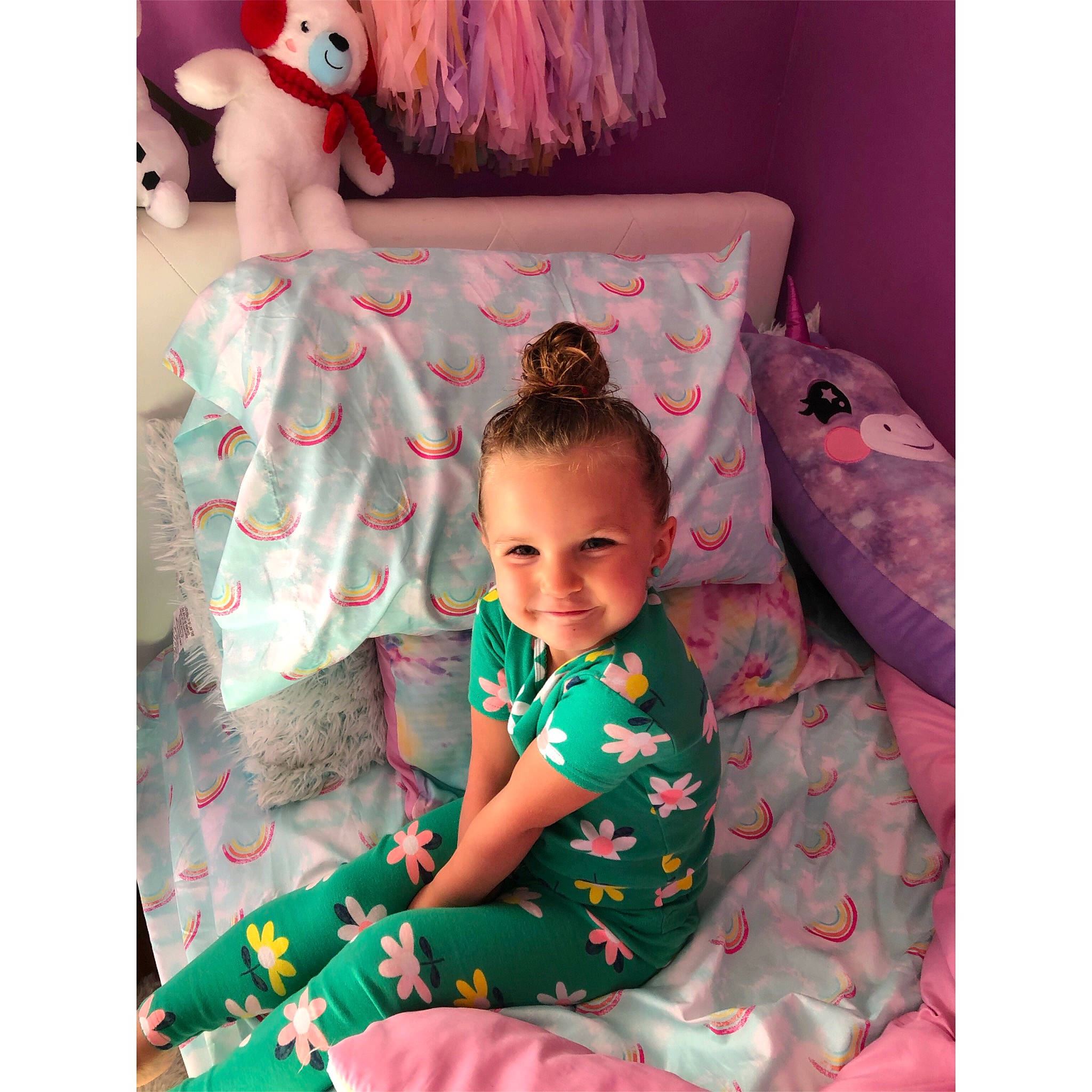 Emma is registered to the contest to win money with this photo: arm, baby, baby_toddler_clothing, comfort, dress, font, happy, joy, magenta, mammal, pattern, person, pink, product, purple, shirt, sleeve, smile, t_shirt, textile