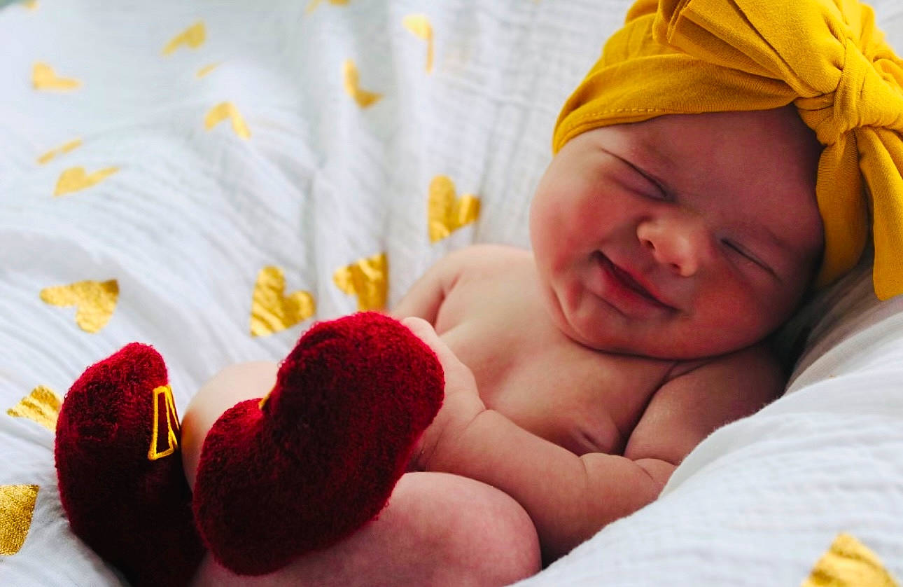 Harleigh is registered to the contest to win money with this photo: arm, baby, baby_sleeping, child, comfort, eye, finger, hand, happy, headgear, headwear, linens, mouth, nail, person, skin, smile, textile, thumb, toddler