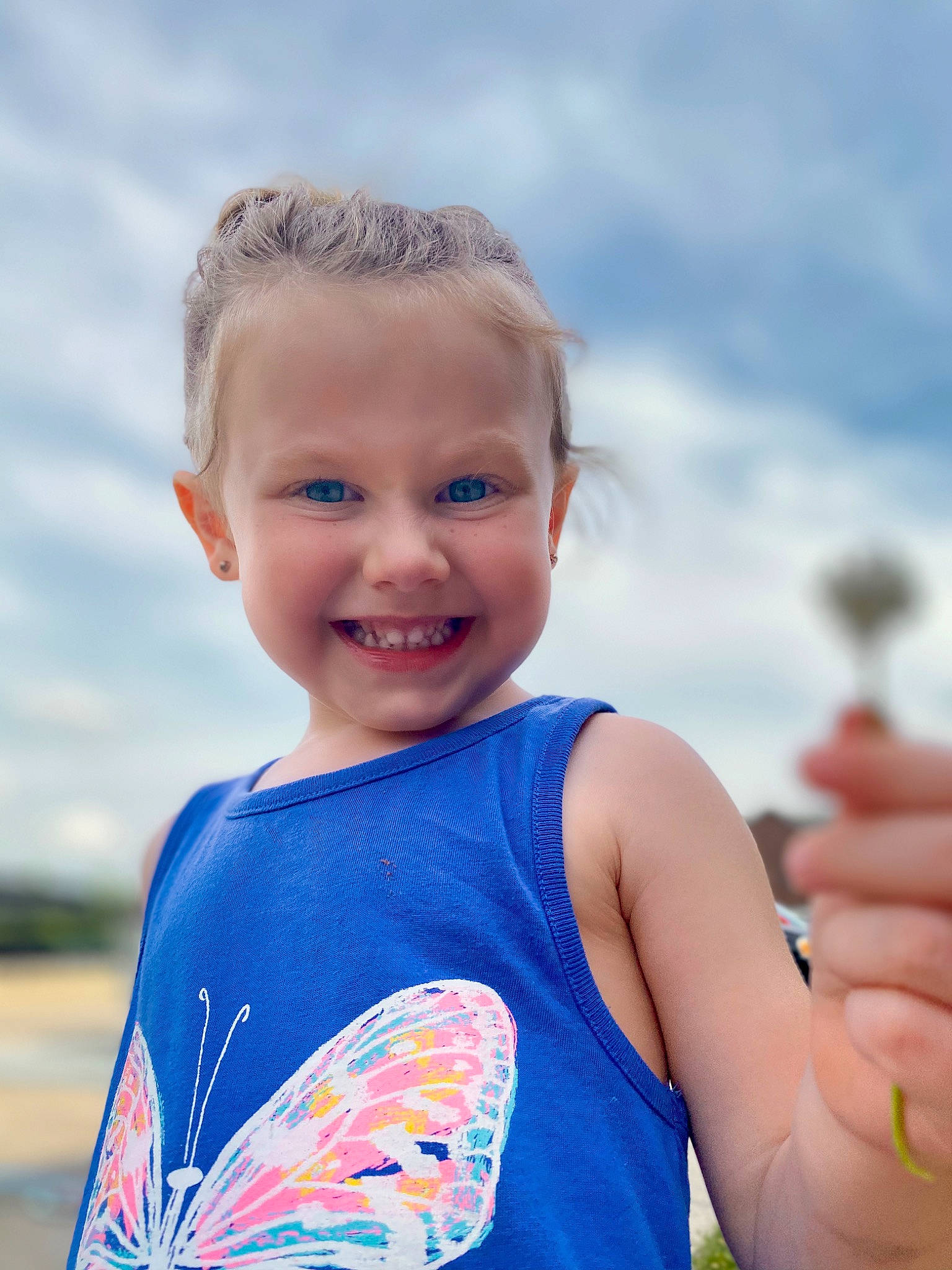 Kali joined the competition — help win amazing prizes! blond, blue, child, child_model, eye, face, facial_expression, fun, happy, head, joy, organ, people, person, play, skin, sky, smile, standing, summer