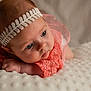 Joy a rejoint le concours — aidez-le/la à gagner de superbes lots ! baby, infant, headband, coral_clothing, lace, blanket, texture, blue_eyes, closeup, portrait, soft_light, curious, resting, cute, newborn, child, skin, hand, face, indoors