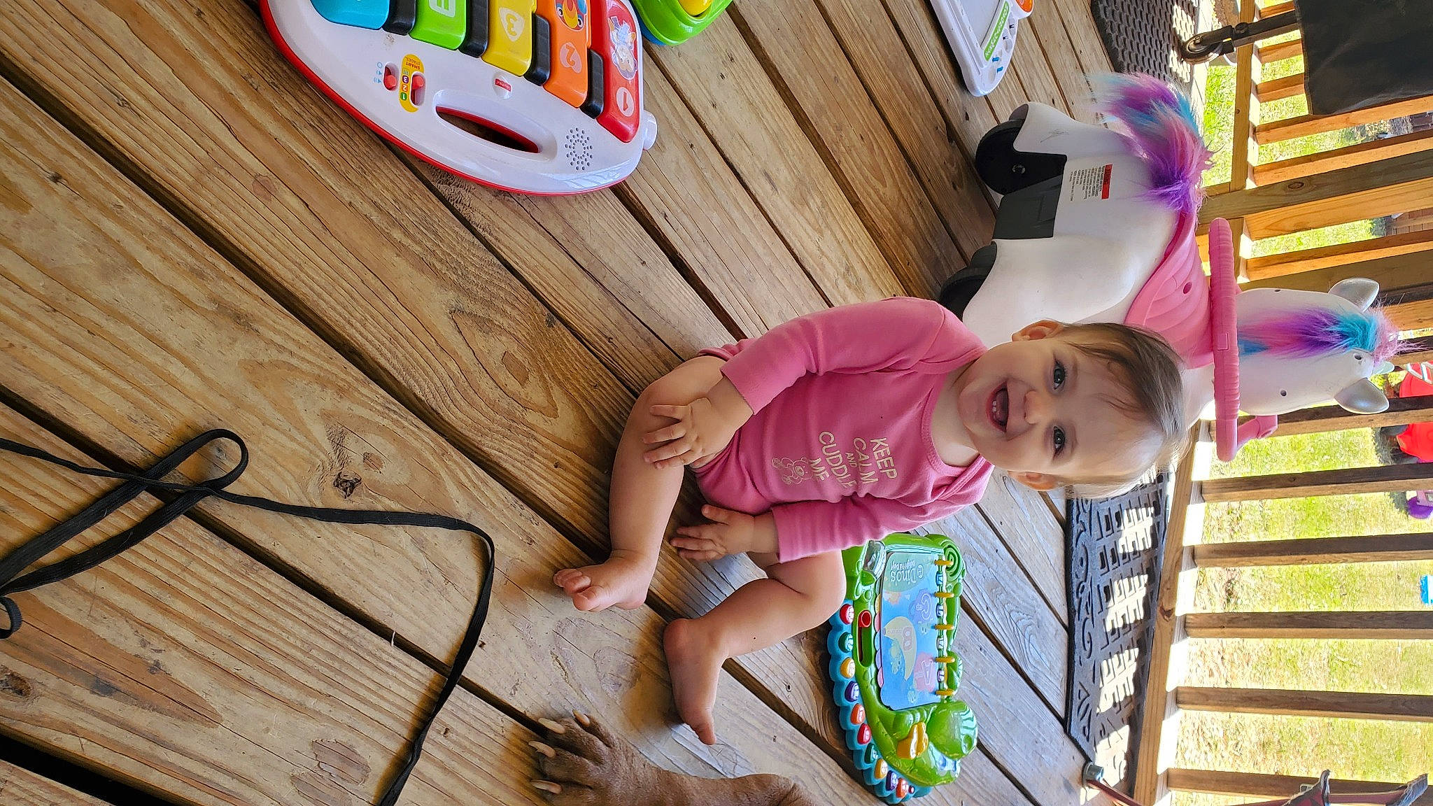 Wisteria is registered to the contest to win money with this photo: baby, baby_toddler_clothing, beauty, child, flooring, foot, fun, green, happy, hardwood, joy, leisure, magenta, pattern, person, pink, play, room, sandal, toddler