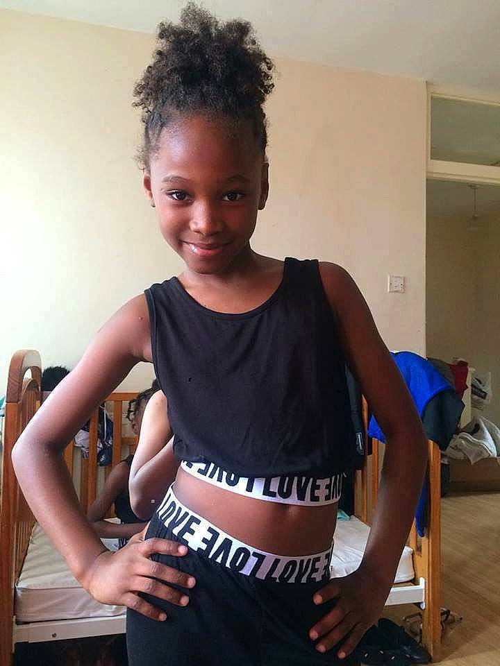 Tamika joined the competition — help win amazing prizes! abdomen, black_hair, clothing, crop_top, hairstyle, hip, human_body, joint, joy, leg, navel, person, shoulder, stomach, t_shirt, thigh, top, trunk, waist