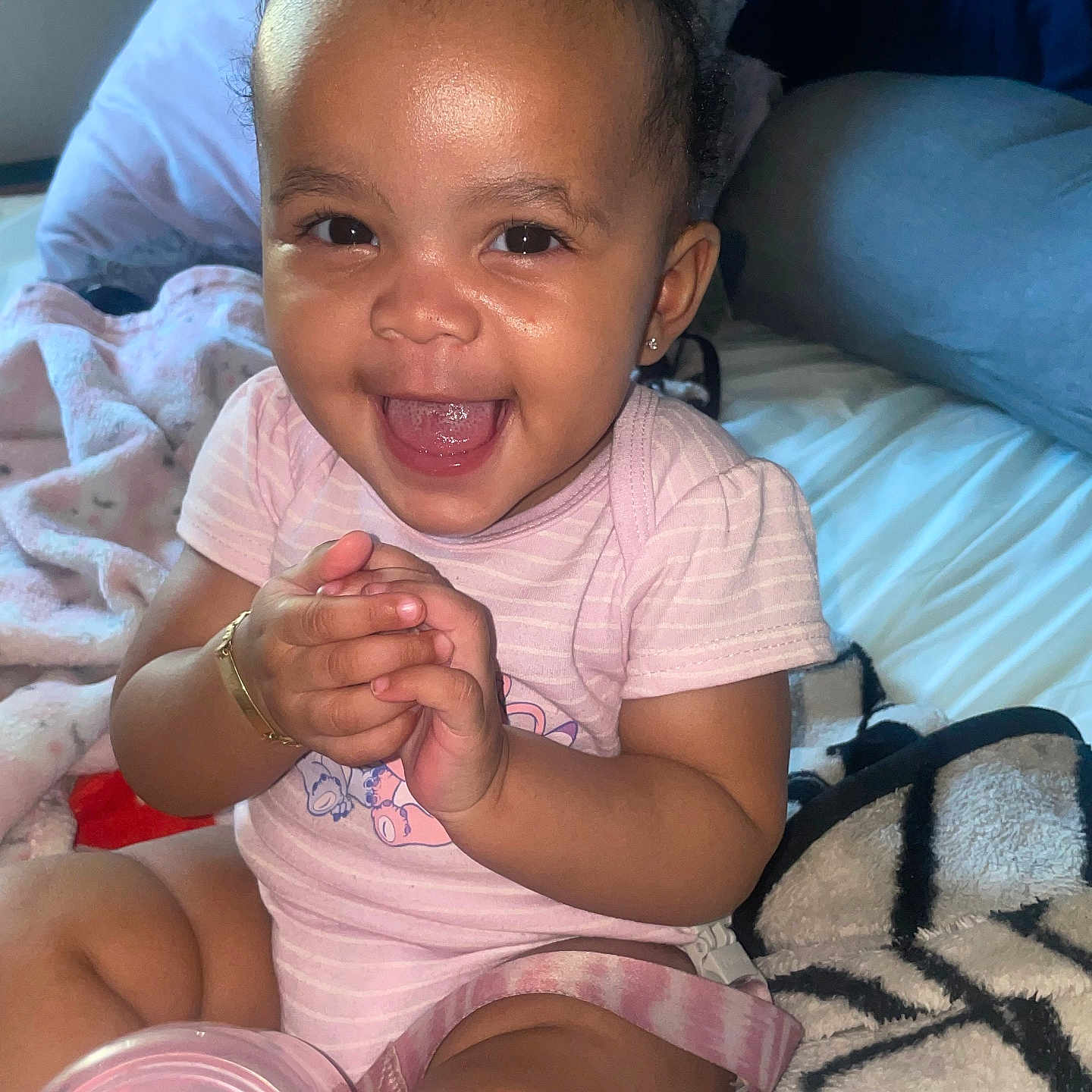 Midior joined the competition — help win amazing prizes! baby, bed, blanket, bracelet, child, clapping, cute, earrings, face, hands, happy, indoor, infant, person, pigtails, pink_clothing, sippy_cup, skin, smiling, toddler