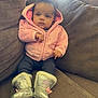 Midior joined the competition — help win amazing prizes! baby, child, hoodie, pink, boots, silver, couch, indoor, cozy, cute, fur_trim, clothing, sitting, young_child, portrait, casual, comfortable, person, apparel, relaxing