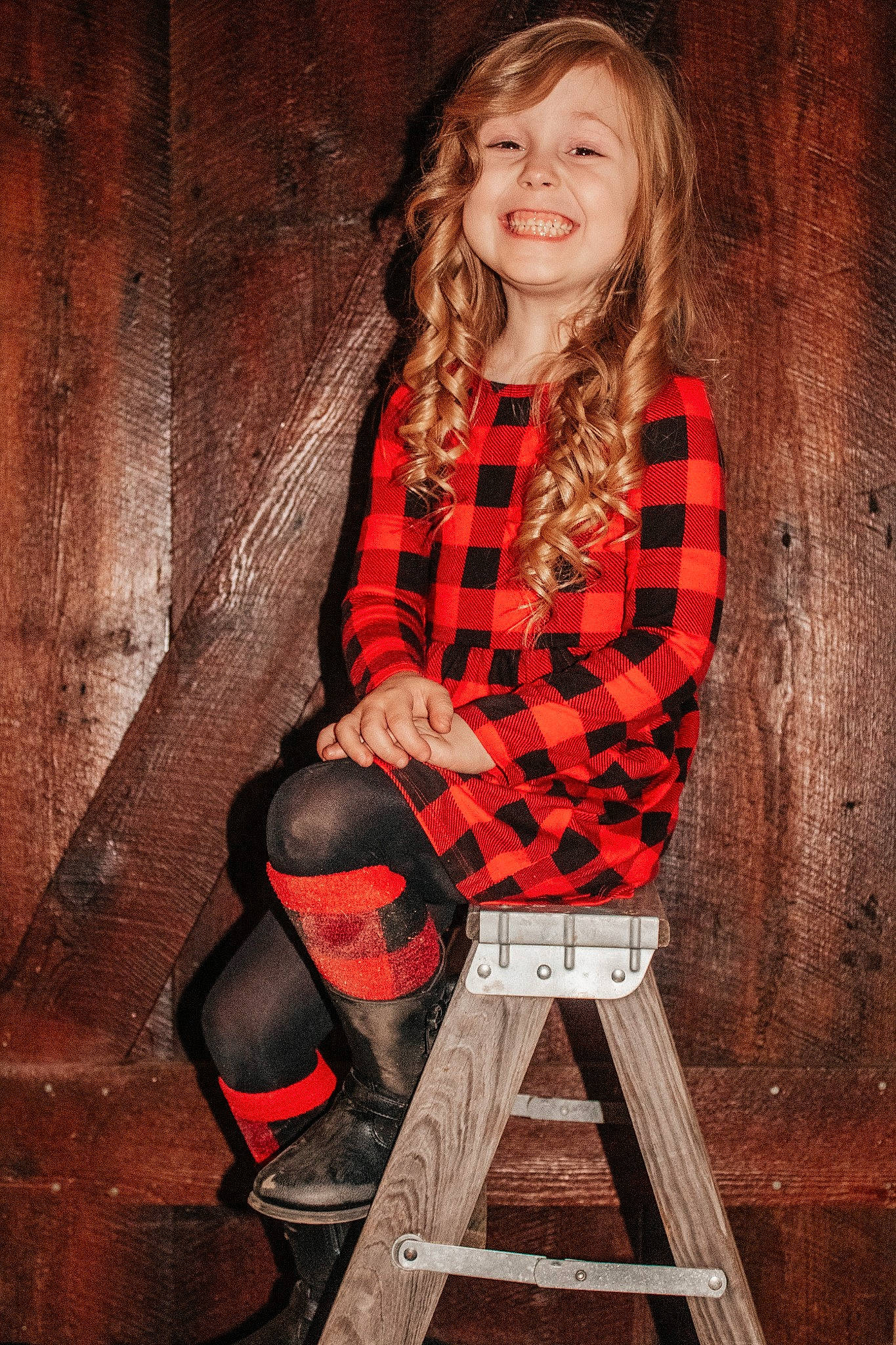 Lillian is registered to the contest to win money with this photo: arm, face, fashion, fashion_design, flash_photography, hair, joy, knee, neck, orange, outerwear, person, plaid, shoe, shoulder, smile, style, tartan, textile, thigh