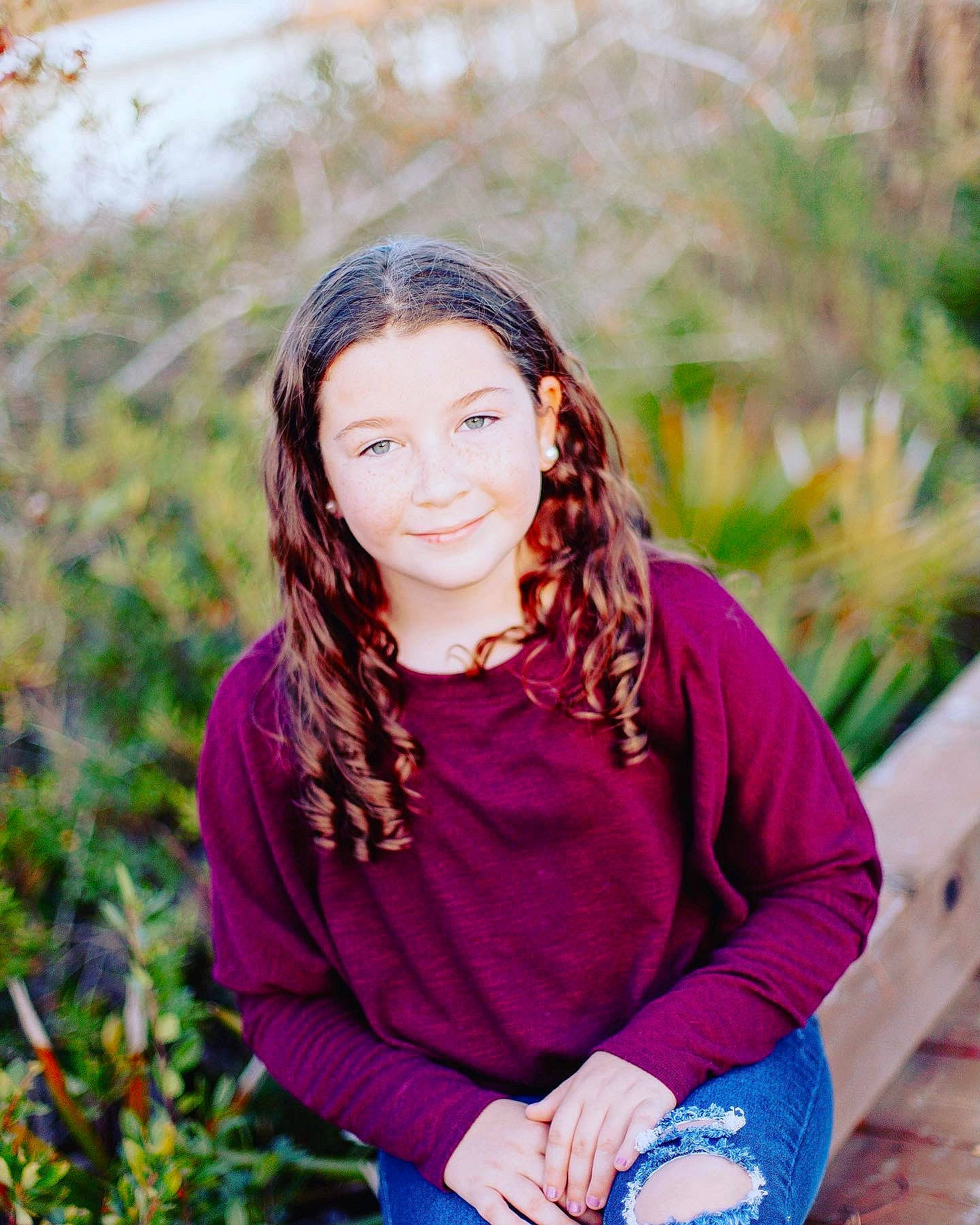 Bryanna is registered to the contest to win money with this photo: beauty, black_hair, brown_hair, electric_blue, flash_photography, friendship, fun, grass, happy, headwear, jewellery, joy, leisure, long_hair, magenta, people_in_nature, person, plant, sitting, smile