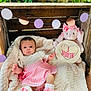 Alivia joined the competition — help win amazing prizes! baby, blanket, bunny, celebration, clothing, cute, decorations, face, heart, infant, milestone, nature, outdoor, pink, portrait, sign, sitting, stuffed_animal, white, wooden_crate