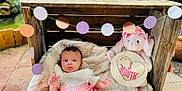 Alivia joined the competition — help win amazing prizes! 3_month, baby, blanket, celebration, circle_garland, cute, decorations, garden, infant, natural_light, outdoor, pink_skirt, plush_toy, portrait, sitting, soft_texture, toy_bunny, white_top, wooden_crate, young_child